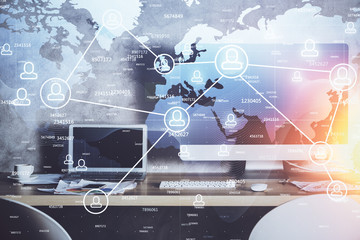 Computer on desktop with social network theme icon. Multi exposure. Concept of international connections.