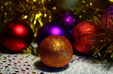 bright colored christmas balls with bokeh