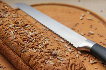 Composition with bread on cutting board, closeup. And space for text