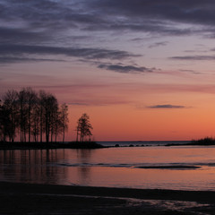 Fototapeta na wymiar Sunrise scene at Lake Vanern. Largest lake of Sweden and the EU. Third largest lake of Europe.