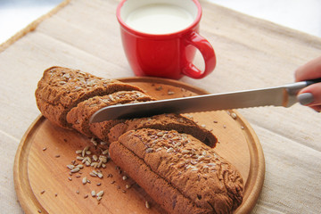Composition with bread on cutting board, closeup. And space for text