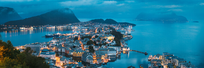 Alesund, Norway. Night View Of Alesund Skyline Cityscape. Historical Center In Summer Evening. Famous Norwegian Landmark And Popular Destination. Alesund, Kiven Viewpoint, Mt. Panorama, Panoramic View