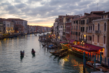 Fototapeta na wymiar Gondolas on the Grand Canal at sunset