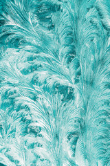 Blue Frosty Glass Ice Background, Natural Beautiful Snowflakes Frost Ice Pattern. Winter Xmas Christmas Abstract Backdrop, Background Or Texture. Turquoise Blue Colour.