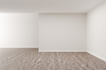 Empty white room with blank walls and brown hardwood floor - presentation or gallery architecture background element