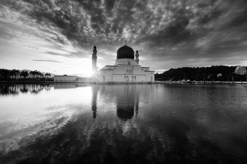 Beautiful reflection of a famous mosque in black and white located at Kota Kinabalu, Sabah, East Malaysia