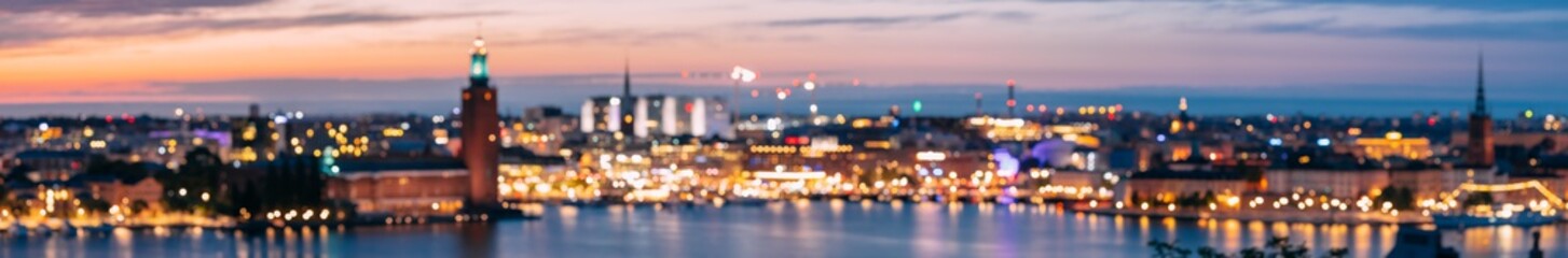 Stockholm, Zweden. Nacht Skyline Abstracte Boke Bokeh Achtergrond Met Beroemde Bezienswaardigheden. Ontwerp achtergrond. Toren Van Het Stadhuis Van Stockholm. Panorama