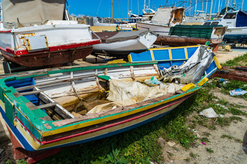 Fototapeta na wymiar Small wooden boats on Manoel Island, Malta