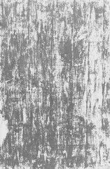 Close-up of a gray wall with white paint badly scratched and peeled off in black and white. High resolution full frame abstract background. Copy space.