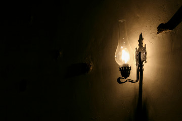 Gas lamp hanging on Wall in village house