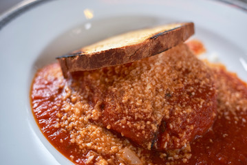 Eggplant Parmigiana with toasted bread