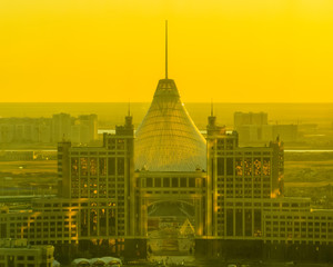 Obraz premium Golden sunset city view from the Baiterek Tower. In Nur-Sultan (Astana), Kazakhstan