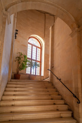 Staircase in the courtyard to the window