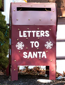 Letters To Santa Mailbox In Front Of House As Christmas Decoration