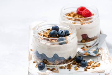 healthy creamy dessert with berries, closeup