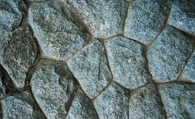 Aged stone wall structure ideal for background and texture