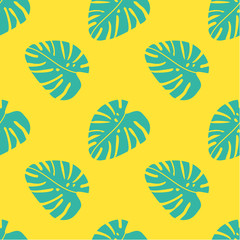 Seamless pattern with palm leaves. Vector frond. Yellow background with tropical leaves. Monstera leaf.
