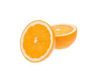 Fresh halved oranges isolated on a white background.