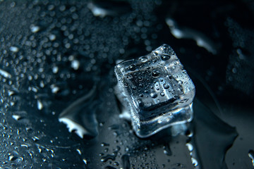 Close up Cubes of ice on black background / melting ice cube