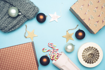 Christmas background . New Year winter holidays concept. Christmas bauble's and candy cane and box of presents.