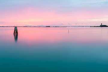 Peaceful sunset on the lagoon of Venice and Burano