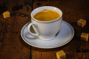 cup of coffee on wooden table