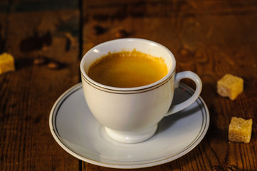 cup of coffee on wooden table
