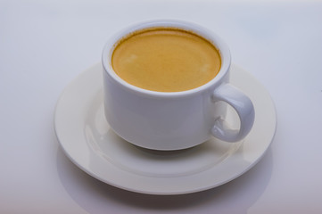 Obraz na płótnie Canvas cup of coffee on white background