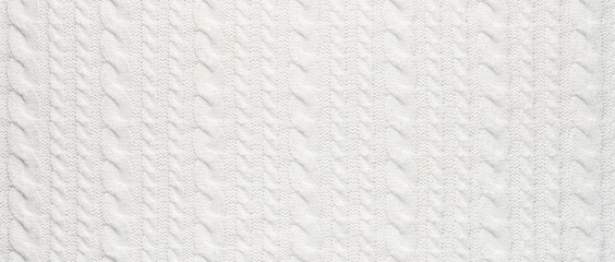 White Knit Fabric Background. Wool Sweater Texture Close Up