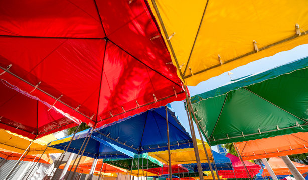 Low angle photo colorful event tents bright colors