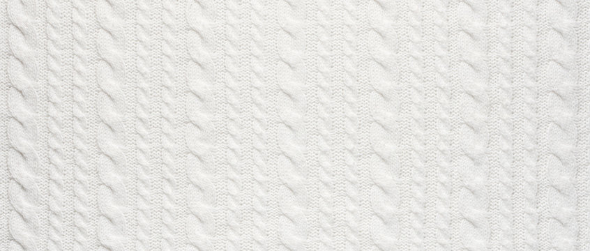 White Knit Fabric Background. Wool Sweater Texture Close Up Stock