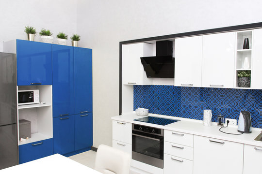 Kitchen interior in light blue colors. Scandinavian style, color 2020 classic blue pantone