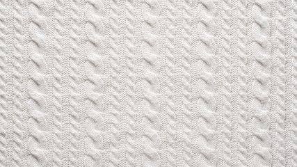 White Knit Fabric Background. Wool Sweater Texture Close Up