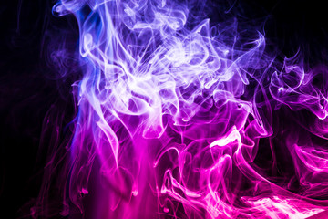 Colored smoke on black background