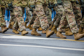 US Army soldiers take part at the Romanian National Day military parade.