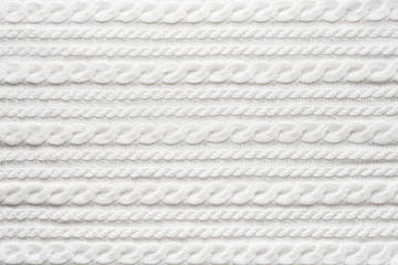 White Knit Fabric Background. Wool Sweater Texture Close Up