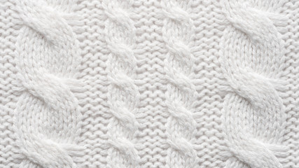 White Knit Fabric Background. Wool Sweater Texture Close Up