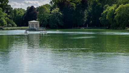 house on an island in the forest