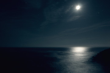 Fototapeta na wymiar Moon over the sea