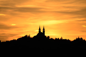 Fototapeta na wymiar Silhouette of the Pöstlingberg Church at sunset. Linz, Upper Austria, Austria