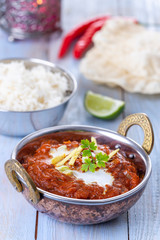 indian chicken tikka masala on wood