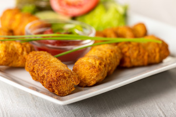 closeup of croquettes on a plate