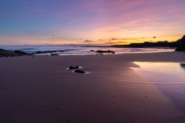 Fototapeta na wymiar Dawn of stunning colors on the beach!