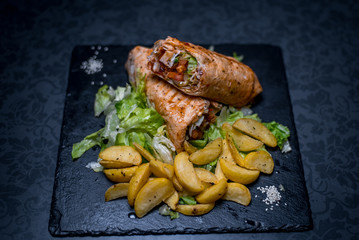 Delicious and juicy kebab with French fries