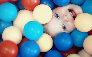 A small child is playing with toy