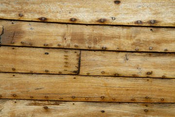 side of a wooden boat background
