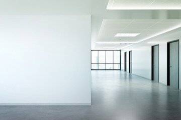 Blank wall in office mockup with large windows and sun passing through 3D rendering