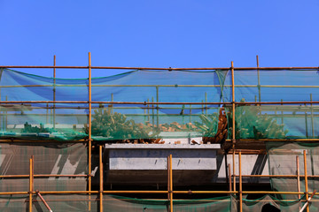 Naklejka premium Construction site scaffolding