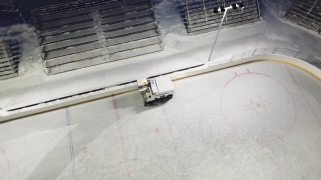 Aerial view of the ice resurfacer to clean and smooth the surface of a sheet of the ice rink