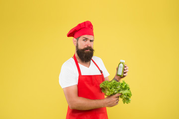 hipster make vitamin summer juice. healthy eating and dieting concept. cook hold fresh and blended...